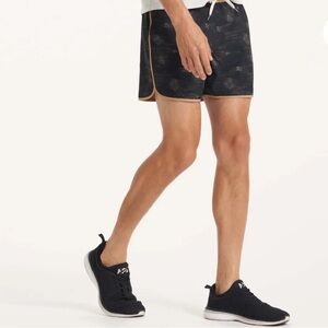 Vuori banks 5” Black Athletic Shorts with Gold Trim